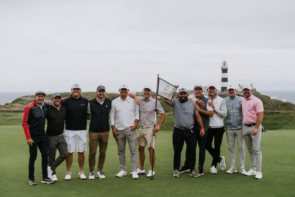 A Lyons Links group of golfers by the lighthouse at Old Head, on a Southwest Ireland golf tour